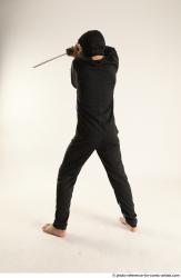 Man Young Athletic Fighting with sword Standing poses Casual Asian